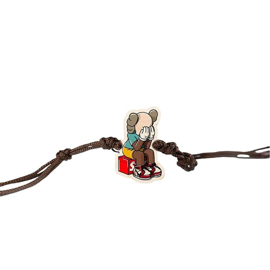 KAWS | Premium Wooden Rakhi | Handmade Paper Packing | Soft Nylon Thread | Size - 4 x 3 cm