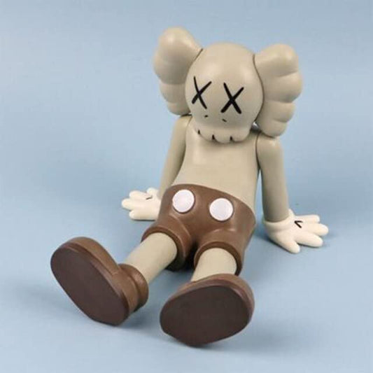 KAWS Model Art Figure | Unique Artwork Famous Character | 11 X 9 X 9 cm | Feet, Hands & Arms Rotate | No Box Packing (KAWS Relaxing - Brown),