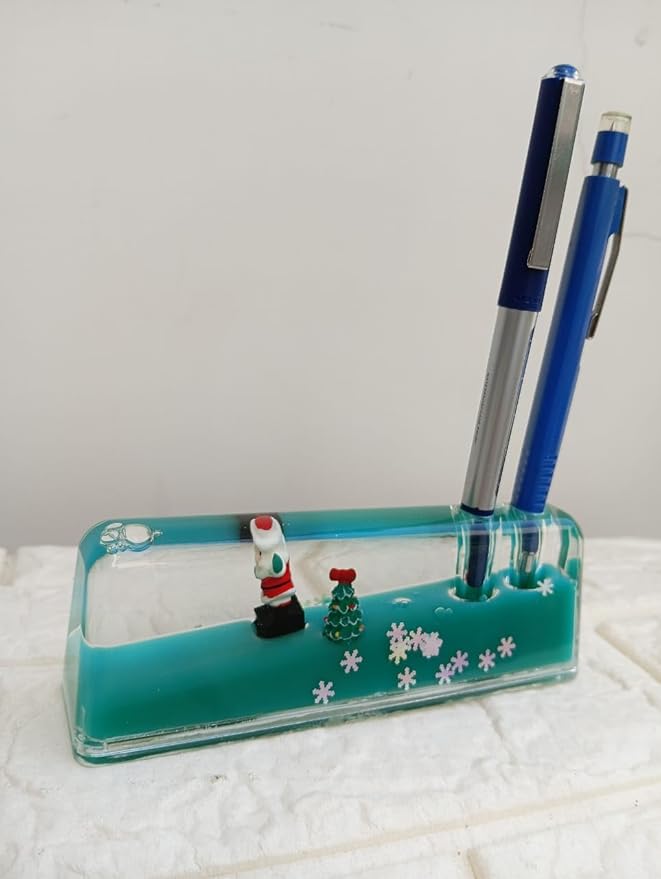 Floating Pen Stand and Desk Showpiece, Liquid-Filled Pen Holder, Decorative for Office and Home, Study, or Workspace (Santa Claus & Christmas Tree Figures Green) Size- 15X5 CM