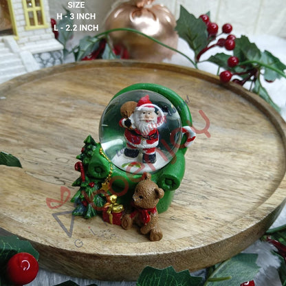 Christmas Santa Claus Snow Globe Glitter Dome Water Christmas Decoration with Santa in Sofa Base, Size Approx 8 cm (No Music or Light)